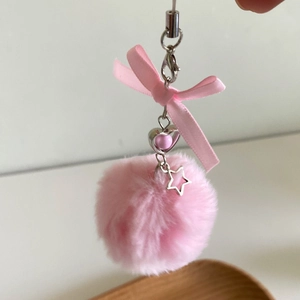 Pink faux fur pompom keychain with ribbon bow and star pendant for mobile accessories