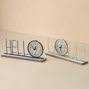 Modern iron table clock with HELLO and GOOD letter designs on a wooden base
