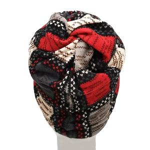 Macro shot of knitted turban hat with geometric jacquard pattern and twisted knot detail