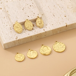 Golden stainless steel religious coin pendants with Saint Mary and angel engravings
