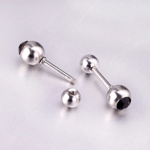 Detailed view of silver stainless steel stud earrings with black round stone and ball back