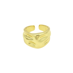 Detail shot of wide gold-plated open ring with irregular ripple texture and metallic luster
