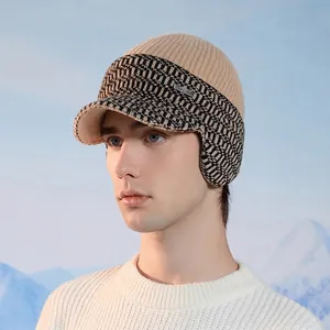 Winter thermal knit baseball cap with ear flaps for men in camel and black textured weave