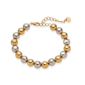 Detail of two-tone gold and silver beaded stainless steel bracelet with lobster clasp