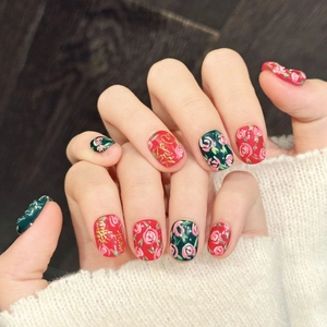 Press-on nails with red rose print and gold Fu character in a vintage color-clash design