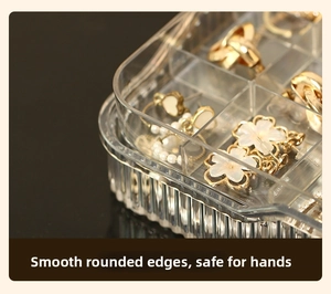 Macro shot of smooth rounded corners and multiple compartments in a clear jewelry box