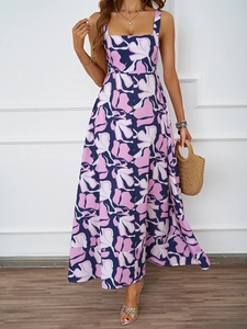 Detail of floral printed maxi dress with square neck and purple abstract patterns