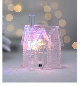 Gros plan d'une décoration maison LED rose transparente pour ambiance festive de Noël
