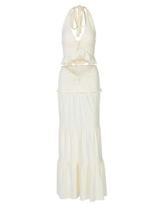 Women's two-piece cream halter top and layered maxi skirt set for summer beach vacations