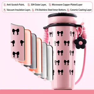 Pink insulated stainless steel cup with bow pattern and 6-layer vacuum insulation