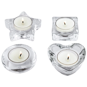 Set of four geometric clear glass tea light candle holders including star and heart shapes