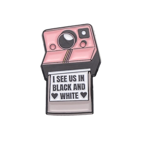 Pink vintage camera metal brooch with I See Us In Black And White photo detail