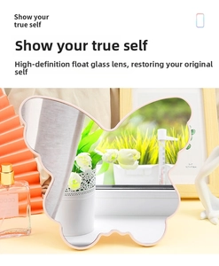 Detail of pink butterfly-shaped desktop makeup mirror with high-definition glass on warm vanity