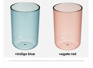 Close-up of translucent indigo blue and agate red minimalist resin toothbrush tumblers
