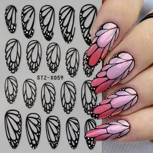 Dark butterfly wing nail stickers STZ-X059 with black hollow patterns and white dots