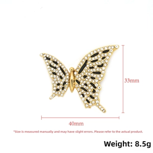 Detailed view of rhinestone butterfly pendant with size markings of 40mm x 33mm