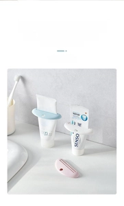 Close-up of colorful manual tube squeezers for toothpaste and skincare creams in a bathroom
