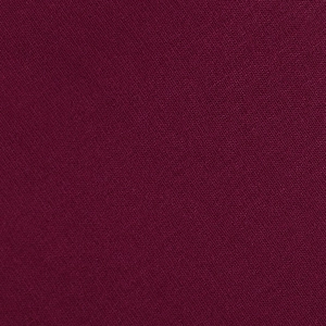 Macro de textile tissé bordeaux montrant les détails de texture et des fibres