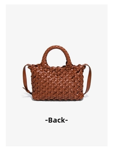 Rear view of brown woven leather tote bag showing detailed texture and handle