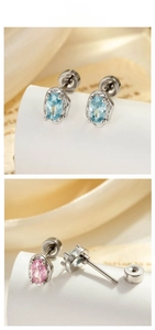 Detail view of oval cut zircon screw-back stud earrings in light blue and pink tones