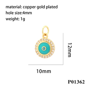 Macro detail of gold-plated evil eye pendant with dimensions 12x10mm and micro zircons