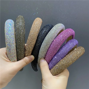 Detail of padded headbands with high-density sparkling rhinestones in various colors