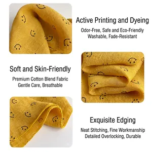 Absorbent cotton baby triangle scarf with yellow smiley face print and hemmed edges