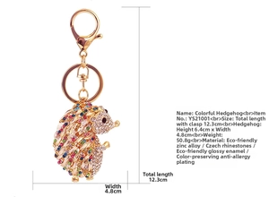 Detailed view of crystal hedgehog keychain with dimensions and material specifications