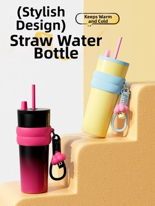 Detail of colorful 316 stainless steel straw cups with cute mushroom charms and silicone sleeves