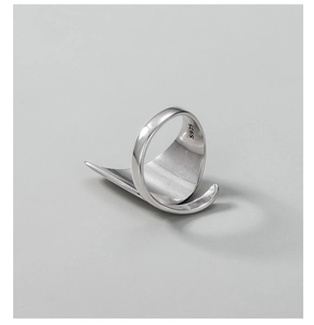 Detailed macro view of S925 sterling silver stamp on minimalist irregular ring