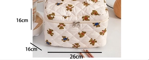 Detailed view of quilted bear print makeup bag with 26x16x16cm dimensions