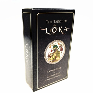 Close-up of The Tarot of Loka card game box with vintage golden illustrations and text