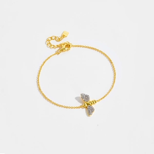 Detailed view of S925 silver bee charm bracelet with sparkling zircon wings and lobster clasp