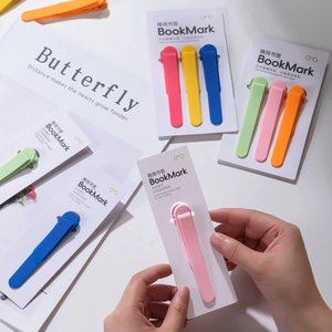 Colorful silicone automatic page-following bookmarks on clean white background