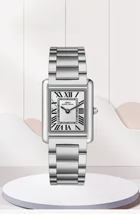 Detail view of rectangular silver watch with roman numerals and wave texture dial