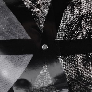 Detailed interior of black lace baseball cap showing inner seams and metal rivet