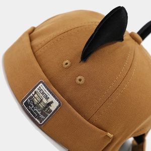 Brown canvas miki hat with black cat ears and vintage rectangular side patch