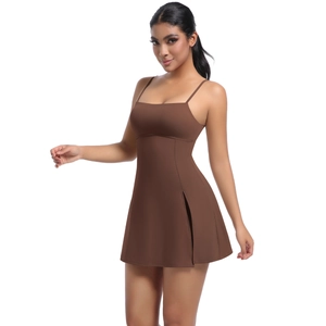 Detail of dark brown athletic dress with side slit and thin shoulder straps for tennis