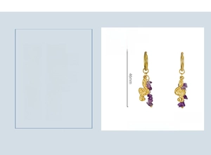 Detail view of treble clef earrings with purple natural stone and 18k gold plating