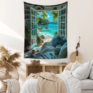 Detailed view of bohemian wall tapestry with ocean window view hanging over bed