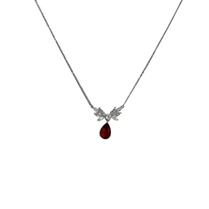 Elegant silver necklace with red teardrop pendant and sparkling zircon accents