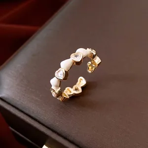 14K gold plated heart ring with white enamel and sparkling zircon stones for women