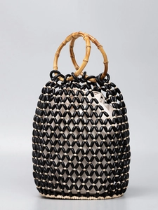 Handmade beaded bucket bag with bamboo handles and drawstring canvas inner bag