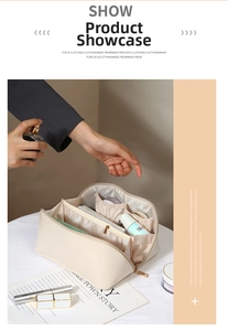 Detailed interior of the cream PU leather makeup bag showing multiple storage compartments