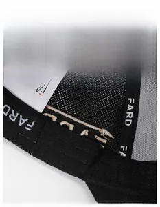 Detail view of the widened moisture-wicking sweatband inside the black mesh baseball cap