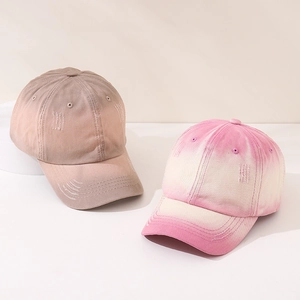 Faded gradient kids baseball caps in tan and purple pink with distressed vintage details