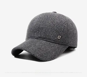 Detailed side view showing dark gray wool texture and metal logo of men winter baseball cap