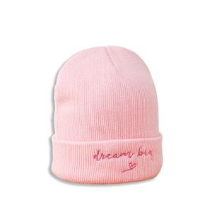 Detailed embroidery of dream big text and heart symbol on pink ribbed knit beanie hat