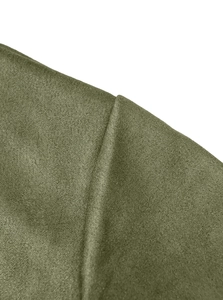 Macro shot of olive green faux suede fabric texture and neat stitching on utility suit