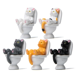 Set of five colorful miniature resin cats sitting on toilets for creative desktop decoration